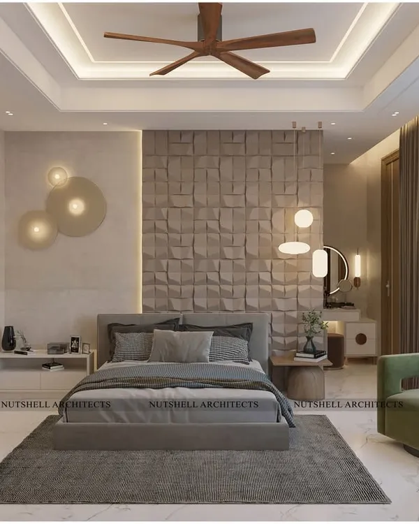 This guest bedroom is a symphony of textures. The focal point is the custom CNC-cut stone panel behind the bed, which adds sculptural drama. We used a neutral palette and layered lighting to create a cozy yet sophisticated atmosphere.