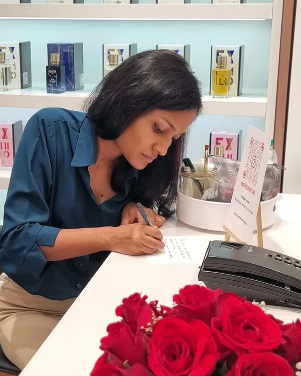 Here I am, completely in my element during a live calligraphy event for Maison Des Parfums. It's a joy to interact with guests and create personalized keepsakes for them on the spot.