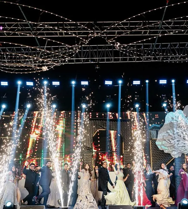 The grand finale of the sangeet, with the entire family on stage. We ended the night with a bang, using cold pyros and a full cast of performers to create an electrifying final memory.