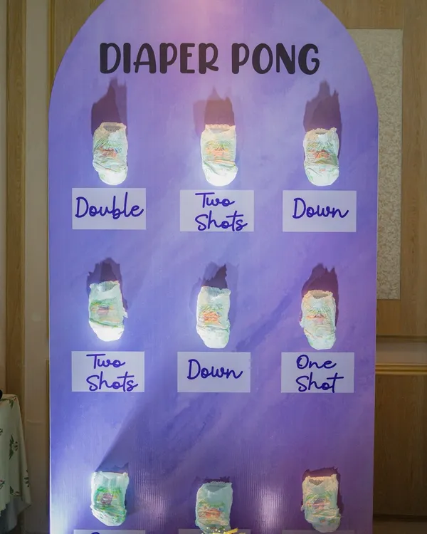 Who says baby showers can't have a little friendly competition? This 'Diaper Pong' game station is always a huge hit, bringing so much laughter and energy to the party. I handle the entire setup for you.