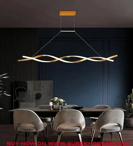 This modern LED chandelier features a curled, ribbon-like design in a golden finish. It's a minimalist yet dramatic statement piece, perfect for hanging above a contemporary dining table to provide sleek, integrated lighting.