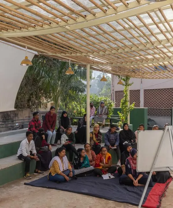 The Basera Community Plaza in Ahmedabad, designed as a safe and inclusive space for a women-led organization. The tiered seating and open pavilion create a flexible environment for workshops, meetings, and daily conversations.