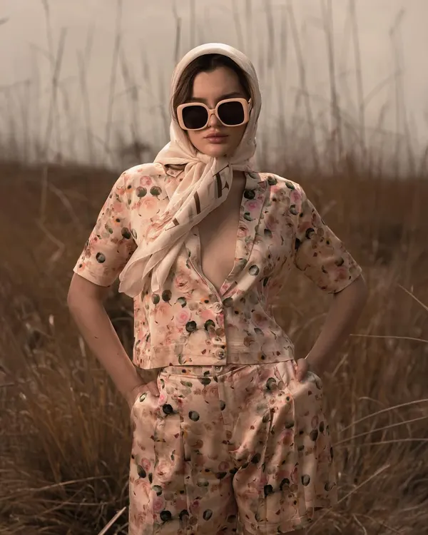 A powerful campaign shot capturing a high-fashion look in a natural, rustic setting. I use outdoor environments and golden hour lighting to create an evocative mood that tells a story, making it perfect for brand lookbooks and editorial features.