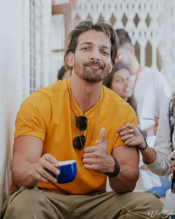 A candid shot of actor Harshvardhan Rane during a relaxed moment. My goal is to capture genuine personality, even with public figures, by creating a comfortable atmosphere.