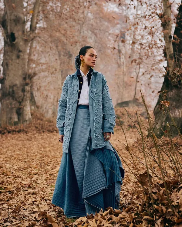 For this Ani Clothing campaign, we shot in the beautiful autumn landscape of Kashmir. The layered, textured blue outfit complements the rustic colors of the fallen leaves.