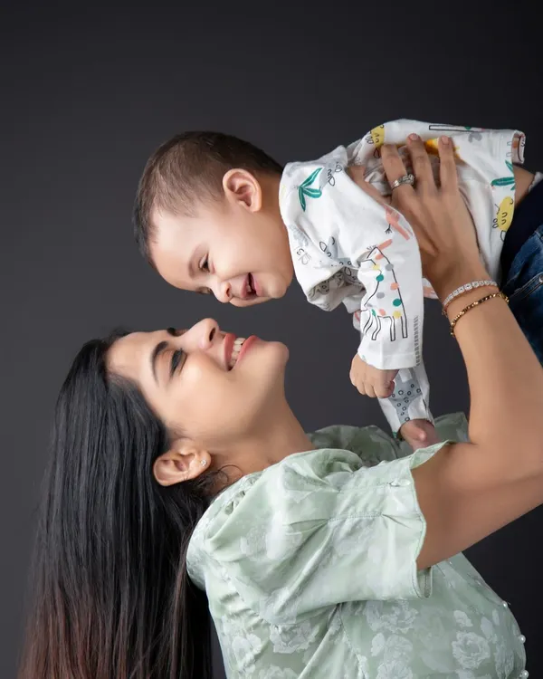 There's nothing like a mother's love. This beautiful moment of a mom lifting her baby up is pure happiness.