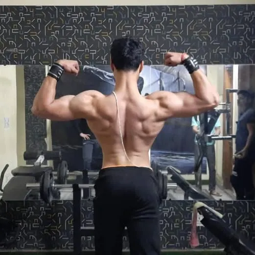 This is the result of dedication and correct technique. My muscle gain programs focus on building a strong, well-defined back, which is the foundation of a powerful physique.