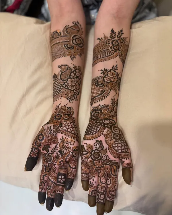A classic non bridal Indo-Arabic design, featuring prominent peacock and floral motifs with lots of open space to make the patterns pop.