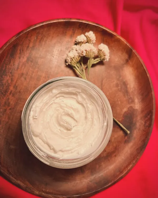 The beautiful whipped texture of our Body Soufflé. This is our Raspberry Sugar variant, which has a sweet, tart, and fruity fragrance.