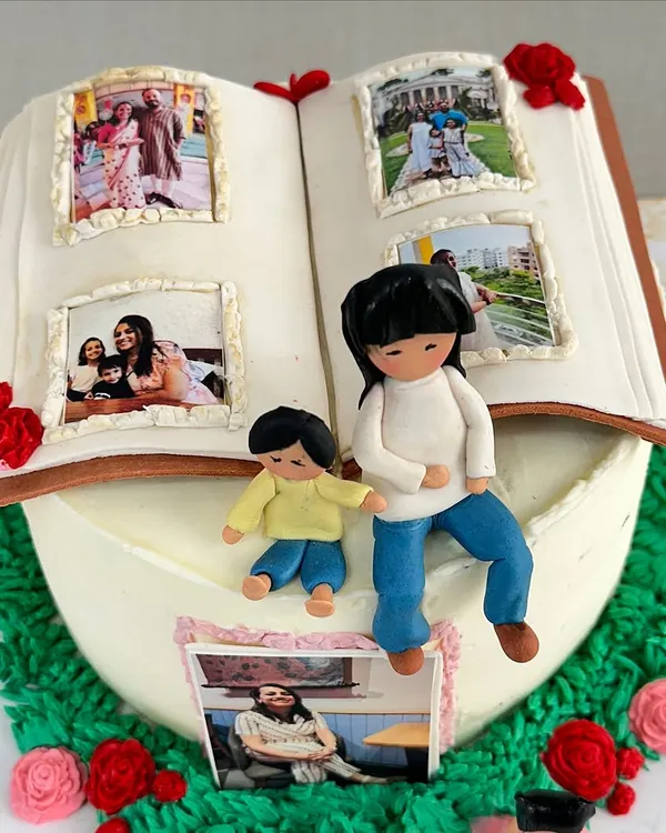 I believe every cake tells a story. This special 40th birthday cake was designed as a photo album, featuring edible pictures of cherished family memories and handmade figures of a mother and her children.