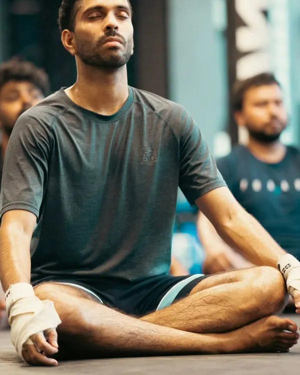 The fight is won in the mind first. We end some sessions with meditation to teach focus, control breathing, and build the mental resilience needed for combat sports.