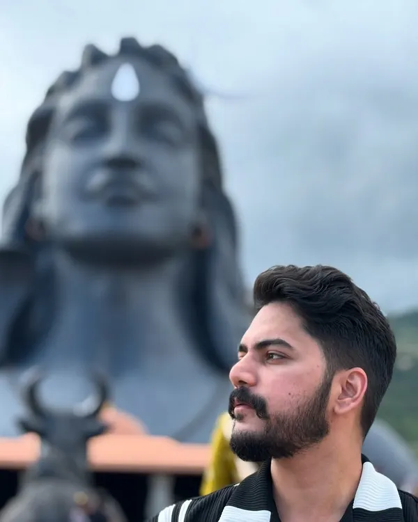 A moment of peace before the Adiyogi statue. My spiritual beliefs are the foundation of my work. For me, it all starts and ends with Mahadev.