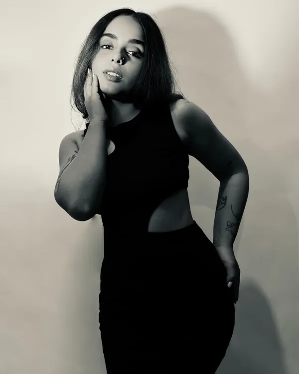 A quiet, introspective moment. Being an artist means feeling things deeply, and I channel all of it, the good and the bad, into my music. This photo reflects the vulnerable, warrior side of my personality.