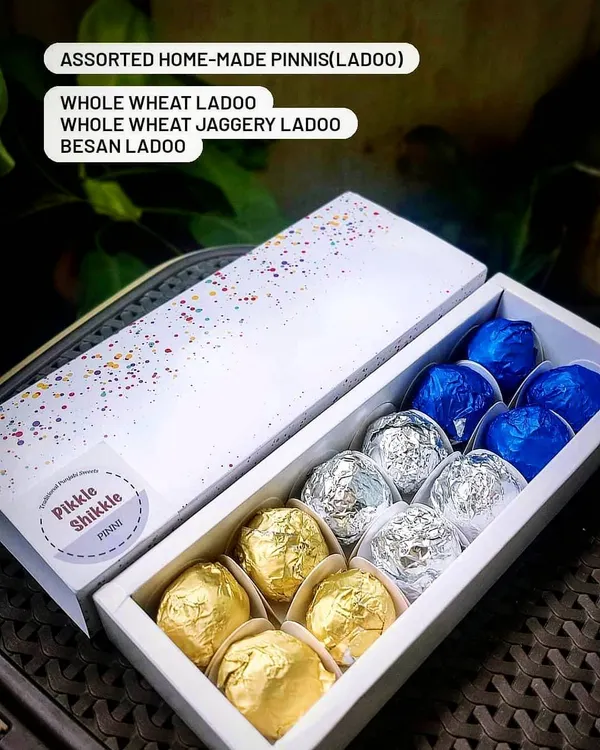 This assorted gift box includes my three types of Pinni: Whole Wheat, Whole Wheat Jaggery, and Besan. It is a perfect way to sample all our traditional ladoo varieties.