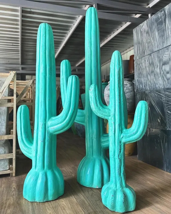 Make a bold, modern statement with our new GRC cactus statues. These vibrant turquoise figures add a fun, desert-chic vibe to your space and require absolutely no watering.