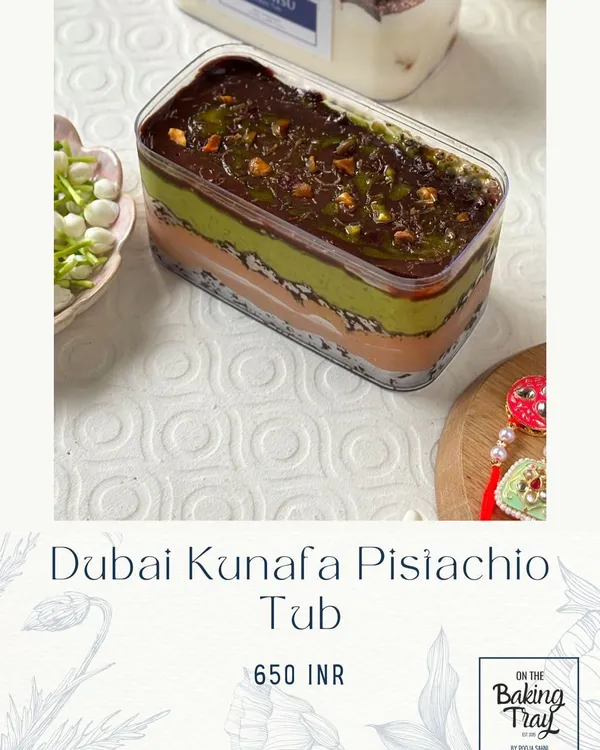 This is my Dubai Kunafa Pistachio Tub, and it's a huge fan favorite. It has layers of cream, crunchy kunafa, and rich pistachio, all topped with a decadent chocolate layer.