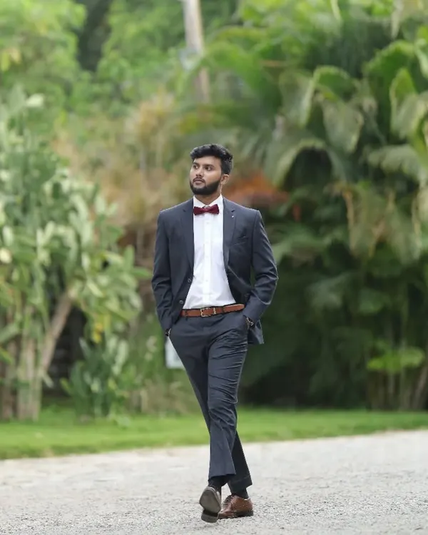 This is my go-to professional look for corporate events. I believe in presenting myself with the same level of quality and attention to detail that I put into my magic. It’s about creating a complete, polished experience for you and your guests.