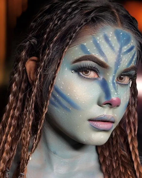I see you. A student's incredible Avatar-inspired fantasy makeup, created in class. This is where we learn to use color and texture to transform a face completely.