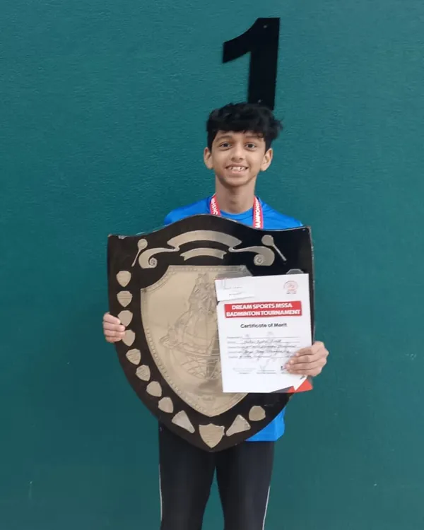 A fantastic achievement for Vihaan, who took first place in the MSSA team event. He is holding the winner's shield and certificate, a result of his consistent training and dedication to the sport.