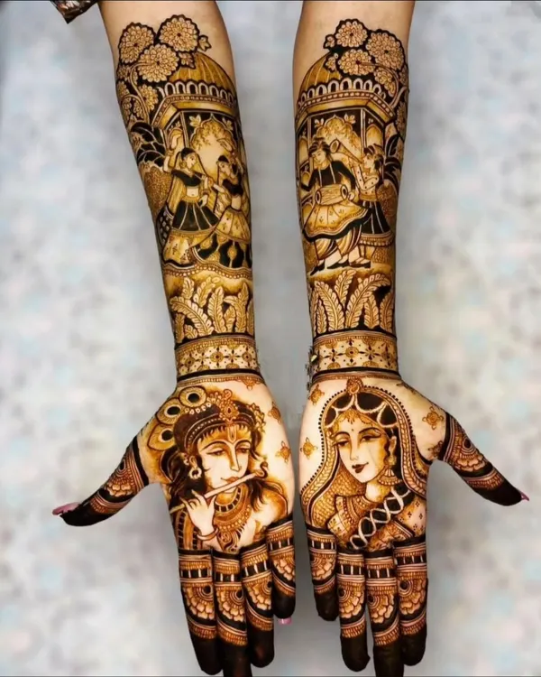 A divine depiction of Radha and Krishna, perfect for adding a spiritual and artistic touch to your bridal henna. The fine lines and shading bring these portraits to life on the palms.