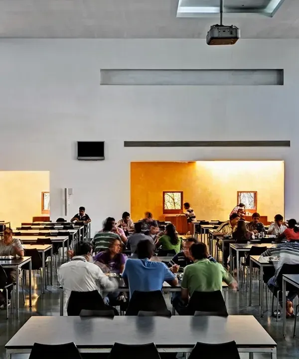 The expansive, light-filled cafeteria at the HP Campus in Bengaluru is designed to be the social heart of the workplace. High ceilings and large windows create an uplifting atmosphere for dining, socializing, and all-hands meetings.
