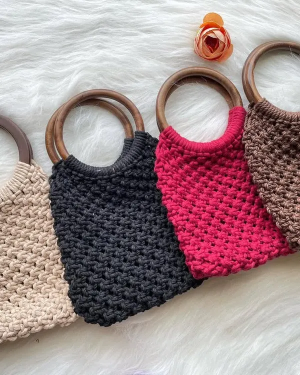 A collection of my popular wooden handle bags, available in a wide range of colors. Here you can see them in versatile beige, classic black, bold red, and earthy brown.
