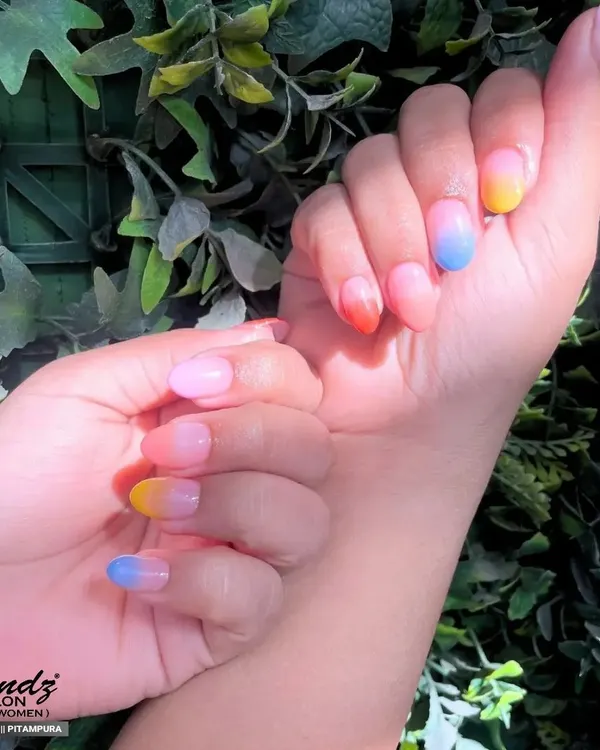 This manicure is pure happiness. I created a beautiful pastel rainbow ombre effect across the nails, with each finger blending into a different soft shade for a dreamy and colorful look.