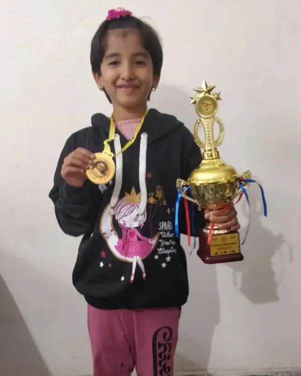 It all starts here. Our U-6 champion Krisha, holding her first big trophy. We focus on making early competitions positive and exciting to build a lifelong love for the game.