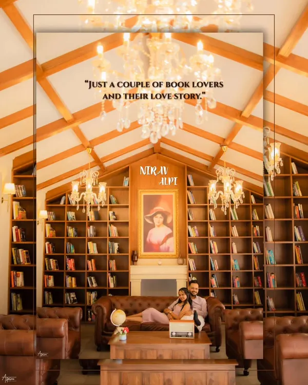 A grand, wide shot of Nirav and Alpi in a beautiful library, perfectly capturing the 'book lovers' theme. This image establishes the scene for their unique and personal pre-wedding story.