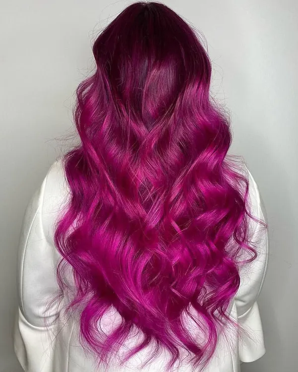 This vibrant magenta pink is for those who are ready to be bold. To achieve this intense hue, the hair needs to be healthy and properly pre-lightened, but the result is a stunning, head-turning color that expresses personality and style.