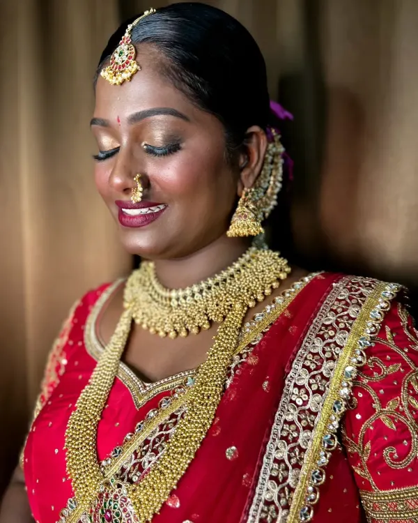 This unedited iPhone click shows the true beauty of dusky skin. I used a luminous foundation and golden-bronze eyeshadow to make her skin glow and her eyes sparkle for her South Indian bridal look.