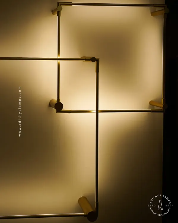 A closer look at our minimalist square LED wall sconces. The slim gold-finished frame emits a soft backlight, creating a halo effect on the wall. These can be arranged in overlapping patterns for a custom art installation.