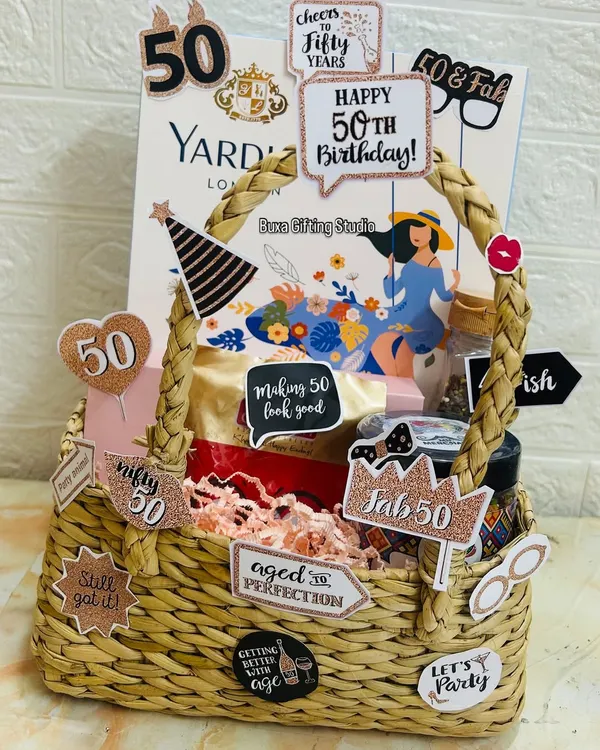 Celebrating a fabulous 50th birthday. This hamper is packed with fun quote cutouts like "Aged to Perfection" and "Fab 50," along with pampering essentials from Enn Beauty and Yardley London.
