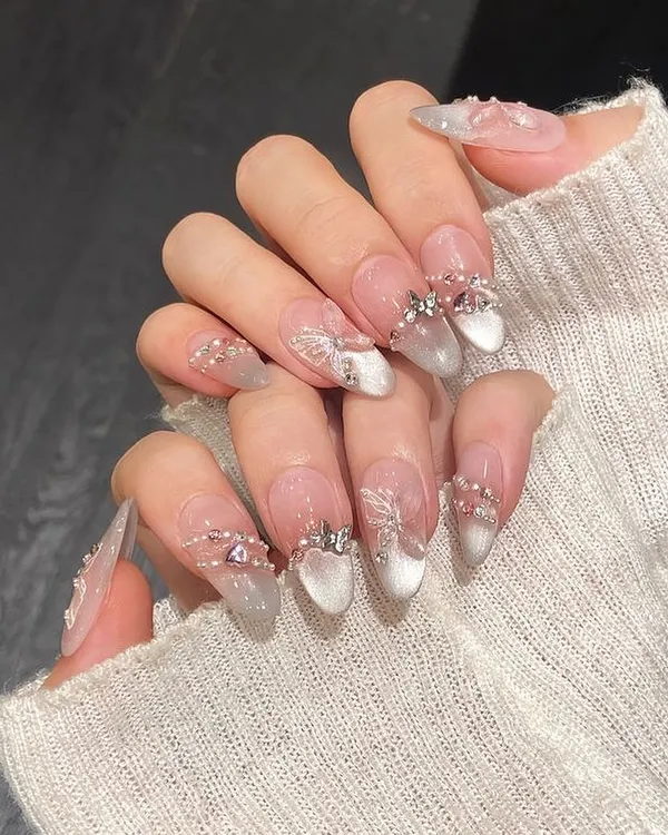 This intricate bridal set is one of our signature looks, featuring a delicate cat-eye base with hand-placed crystals and 3D butterfly details. It’s the ultimate statement for a bride who wants luxury and detail.