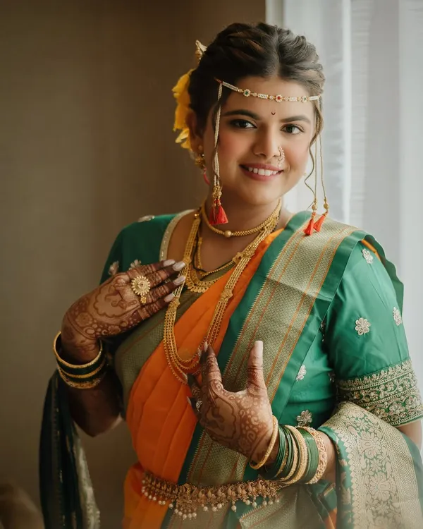 A classic Maharashtrian bridal look, featuring a beautiful nauvari saree. We created a natural, elegant makeup style to let her joyful spirit shine through.