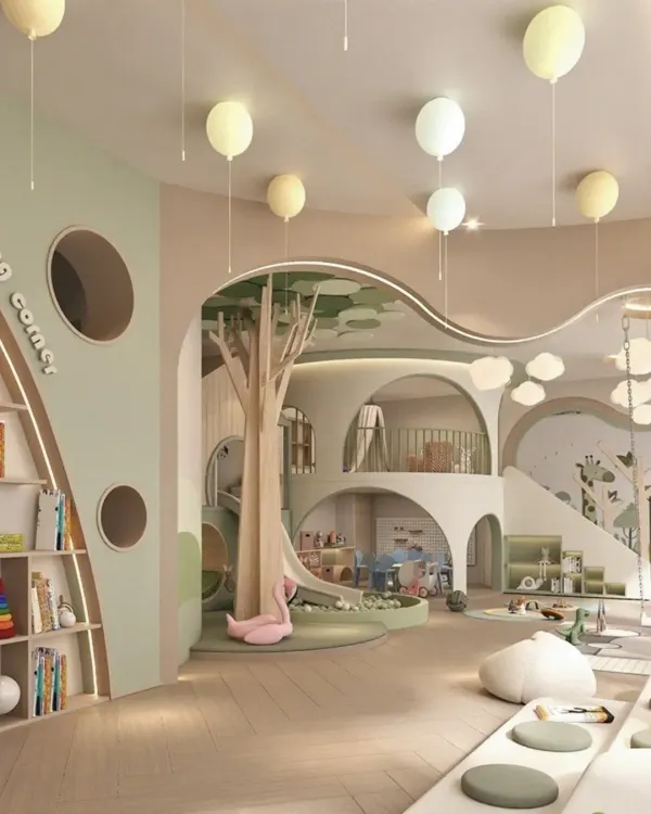 A wide view of a nature-themed kids' playzone, featuring whimsical balloon-like pendant lights, a cozy reading corner with built-in shelving, and soft, playful furniture.