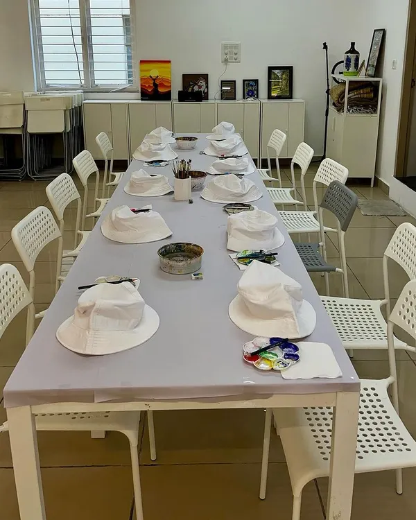 The calm before the creative storm. Our studio is all set up and ready for a bucket hat painting birthday party.