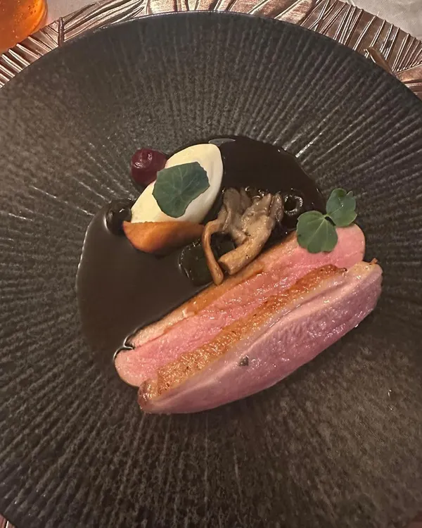 Magret of Duck, a classic French dish. The duck is cured in five spice and cooked a la rosé, served with sunchoke, wild mushrooms, and a rich Sauce Robert.