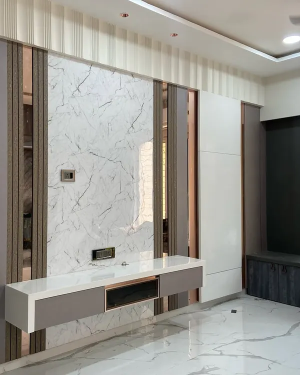 This image shows the folding dining table in its closed state. It retracts completely into the wall unit, freeing up the living room floor space and maintaining a clean, minimalist look.