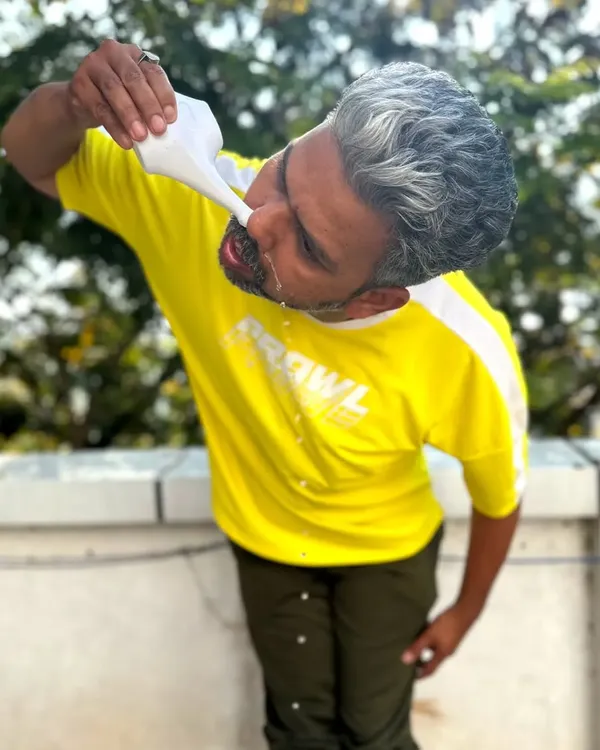 An instructor demonstrates Jal Neti, a yogic technique for nasal cleansing using a neti pot. This practice is excellent for clearing the sinuses and improving respiratory health.