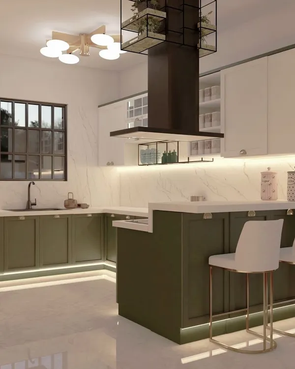 An aesthetic kitchen design that demonstrates our attention to interior details. The space features two-tone cabinetry, under-cabinet and kick-plate LED lighting, and a breakfast bar, combining functionality with modern style.