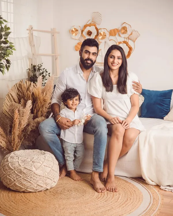 A beautiful family portrait in our boho-themed studio setup. The natural textures and warm tones create a relaxed and inviting atmosphere for your photoshoot.