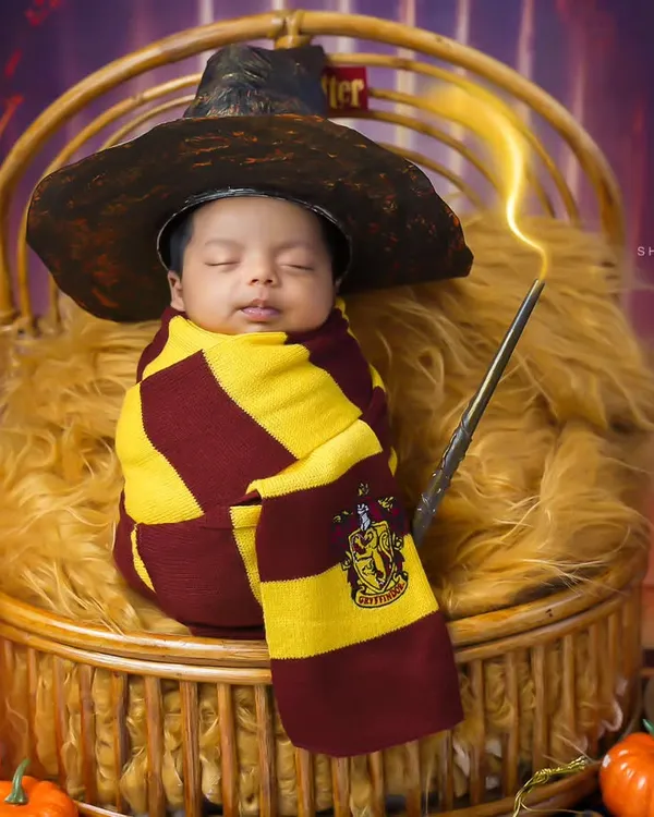 "You're a wizard, baby!" Our Harry Potter themed newborn shoot is perfect for fans of the magical world. We provide the sorting hat, wand, and Gryffindor scarf for the complete look.