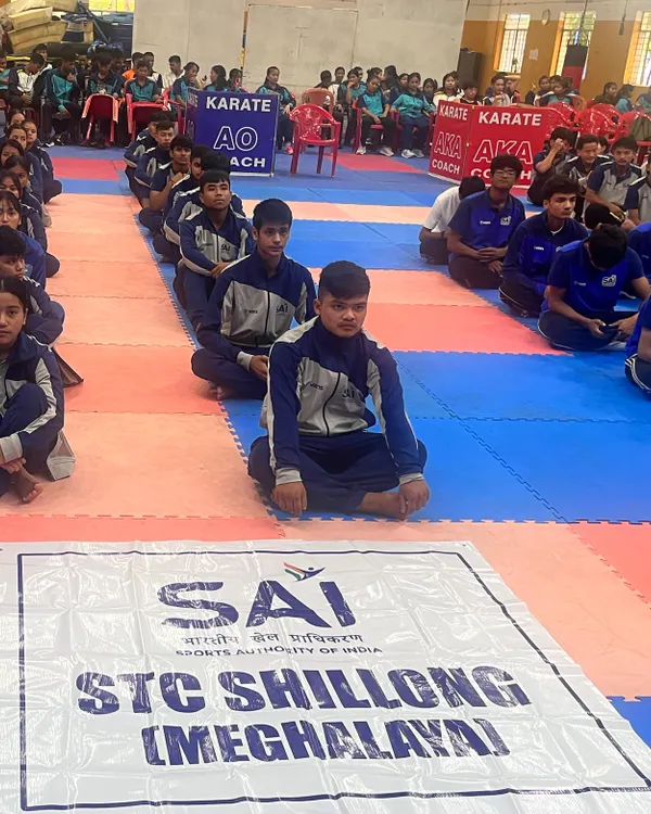 The SAI STC Shillong team seated in formation, ready for a training session. Discipline and respect are the first lessons we practice every single day.