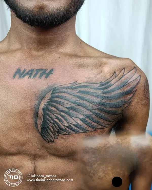 A successful birthmark cover-up on dark skin. This wing tattoo was designed to completely hide the birthmark on the client's chest, demonstrating my ability to work with different skin types and challenges.