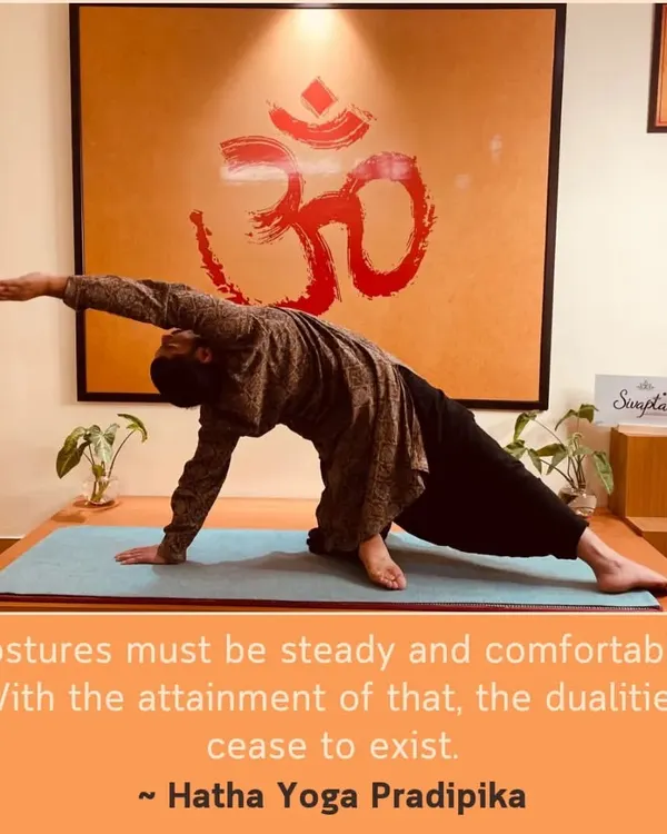As the Hatha Yoga Pradipika says, postures must be steady and comfortable. Here I am in Vasisthasana (Side Plank Pose), finding that balance of effort and ease.