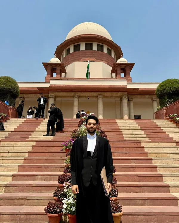 A solo portrait on the steps of the Supreme Court of India. Appearing before the apex court is a privilege and a responsibility I take very seriously in my pursuit of justice for my clients.