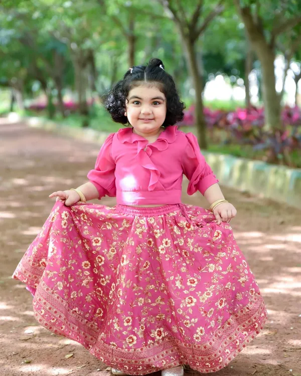A beautiful portrait of a little girl enjoying a day at the park. The natural lighting of outdoor photoshoots creates such a warm and lovely feel.