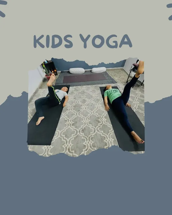 Here are two brothers working together in a small group session at their home. We focus on foundational exercises like these leg raises to build core stability and body awareness.