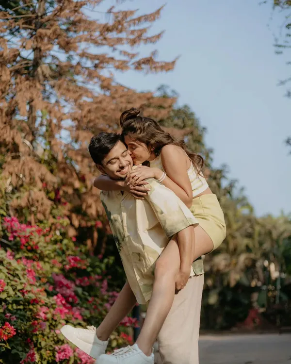 A joyful piggyback ride is the perfect way to capture your fun-loving spirit. We encourage playful interactions to get those genuine smiles and laughs during your pre-wedding shoot.